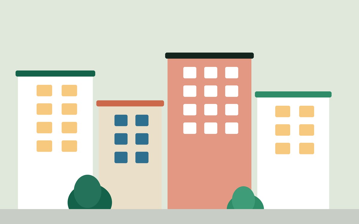 Illustration: a row of low city buildings with awnings and street trees