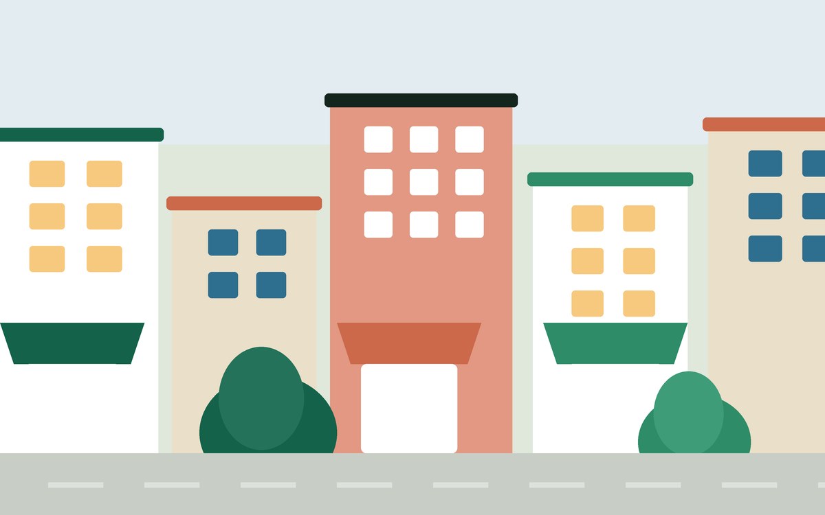 Illustration: a city street of low buildings with awnings and trees